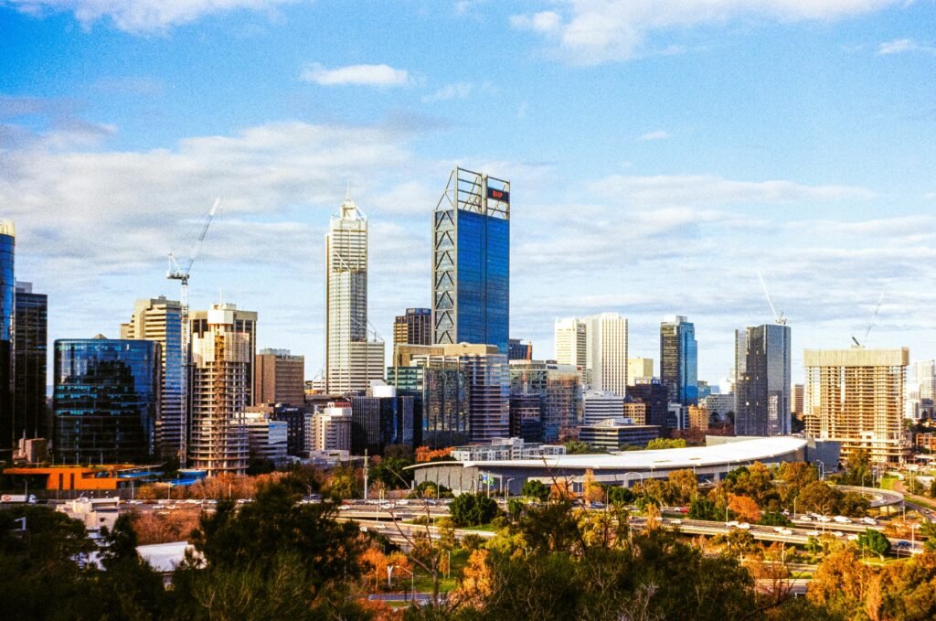 A captivating aerial view of Perth's cityscape featuring modern skyscrapers and urban architecture.