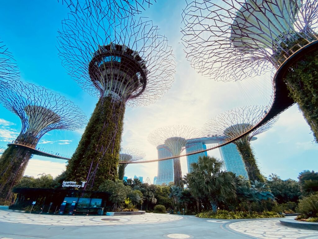 Stunning view of Supertree Grove against the sky at Gardens by the Bay in Singapore.